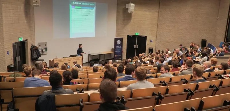 Wide view of a talk in an Erasmus University auditorium