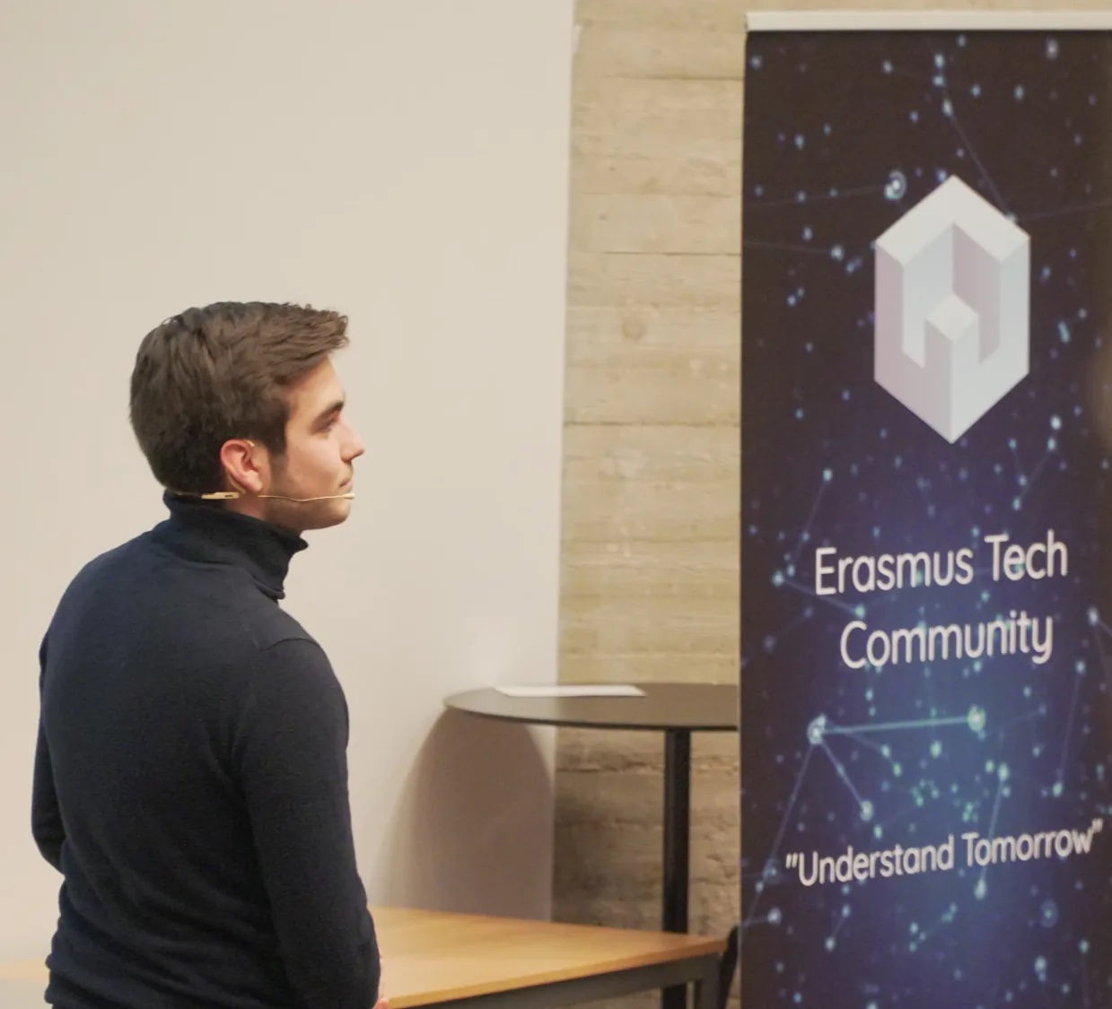 Magnus van Haaren beside an Erasmus Tech Community screen